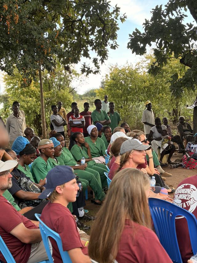 The community and team gathered together